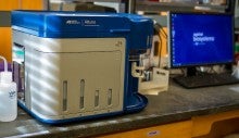 A blue and gray benchtop instrument.