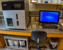 A silver and black benchtop instrument.